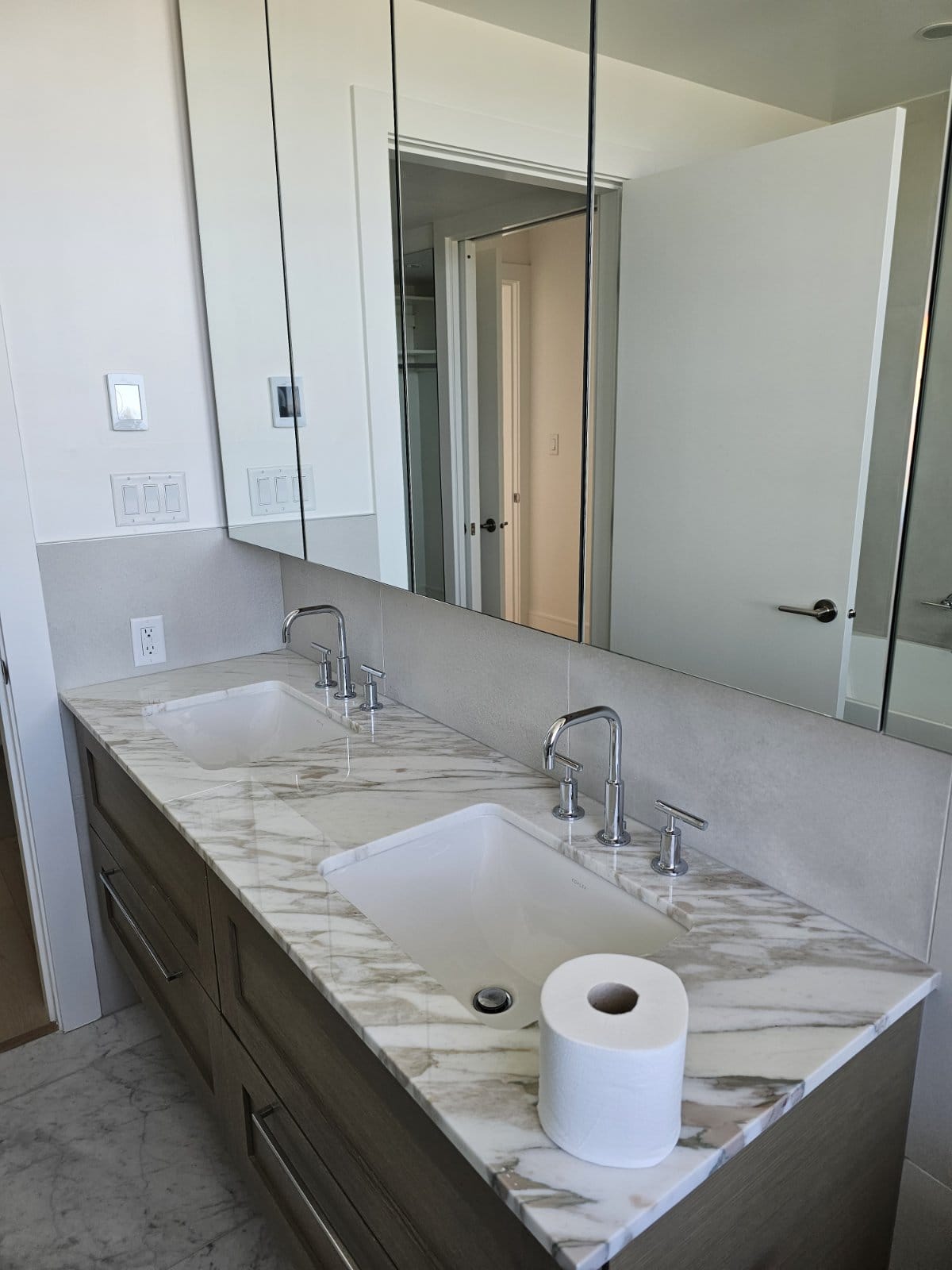 Double vanity bathroom with stone counters