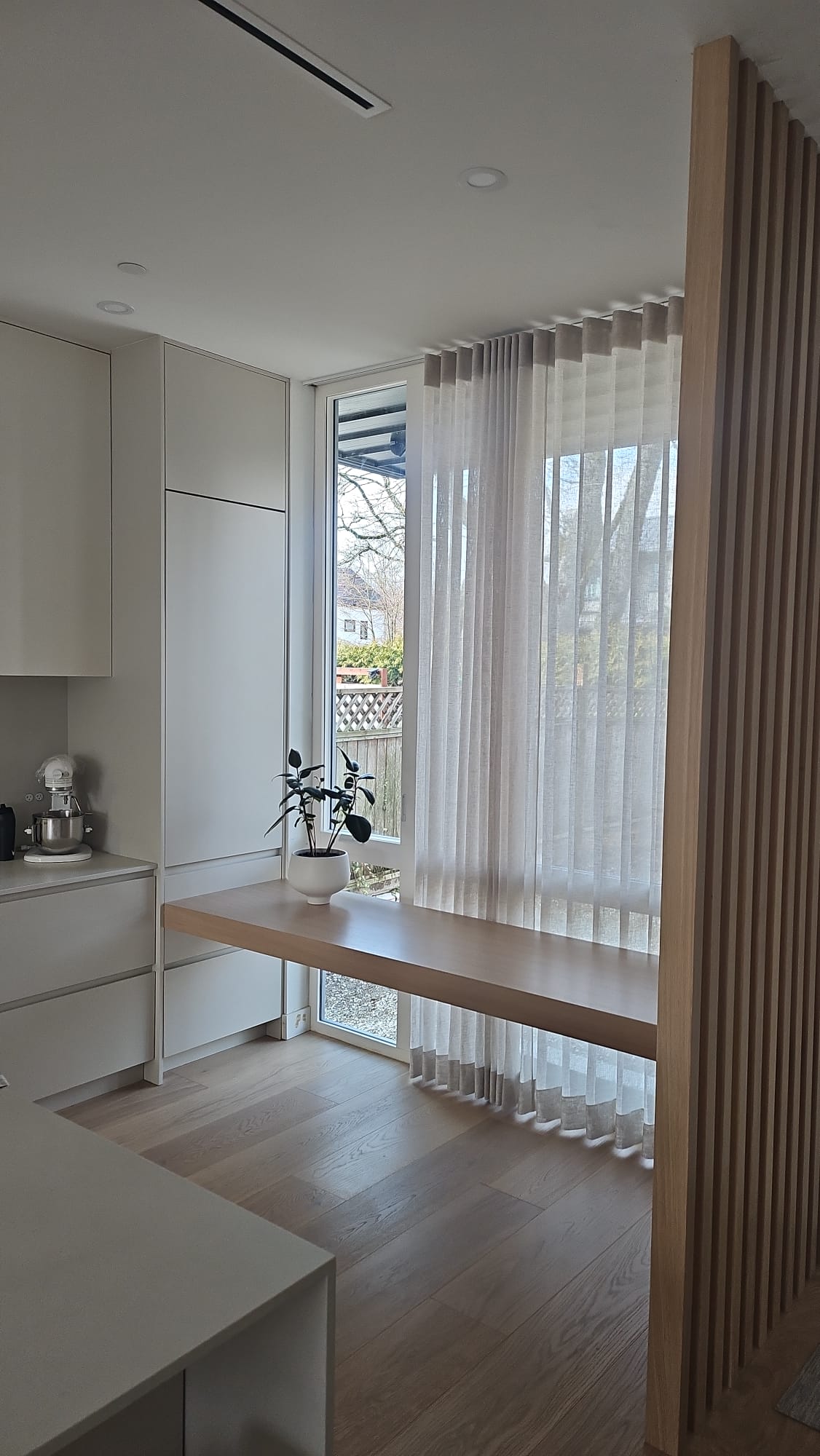 Kitchen with wood slat detail